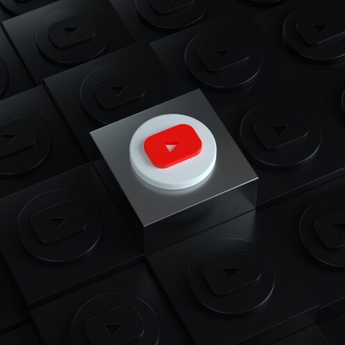 3d-youtube-logo-silver-stand-with-dark-logos-background